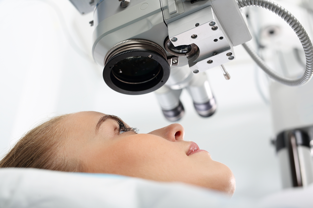 LASIK Explained Blog - Woman Under Eye Machine